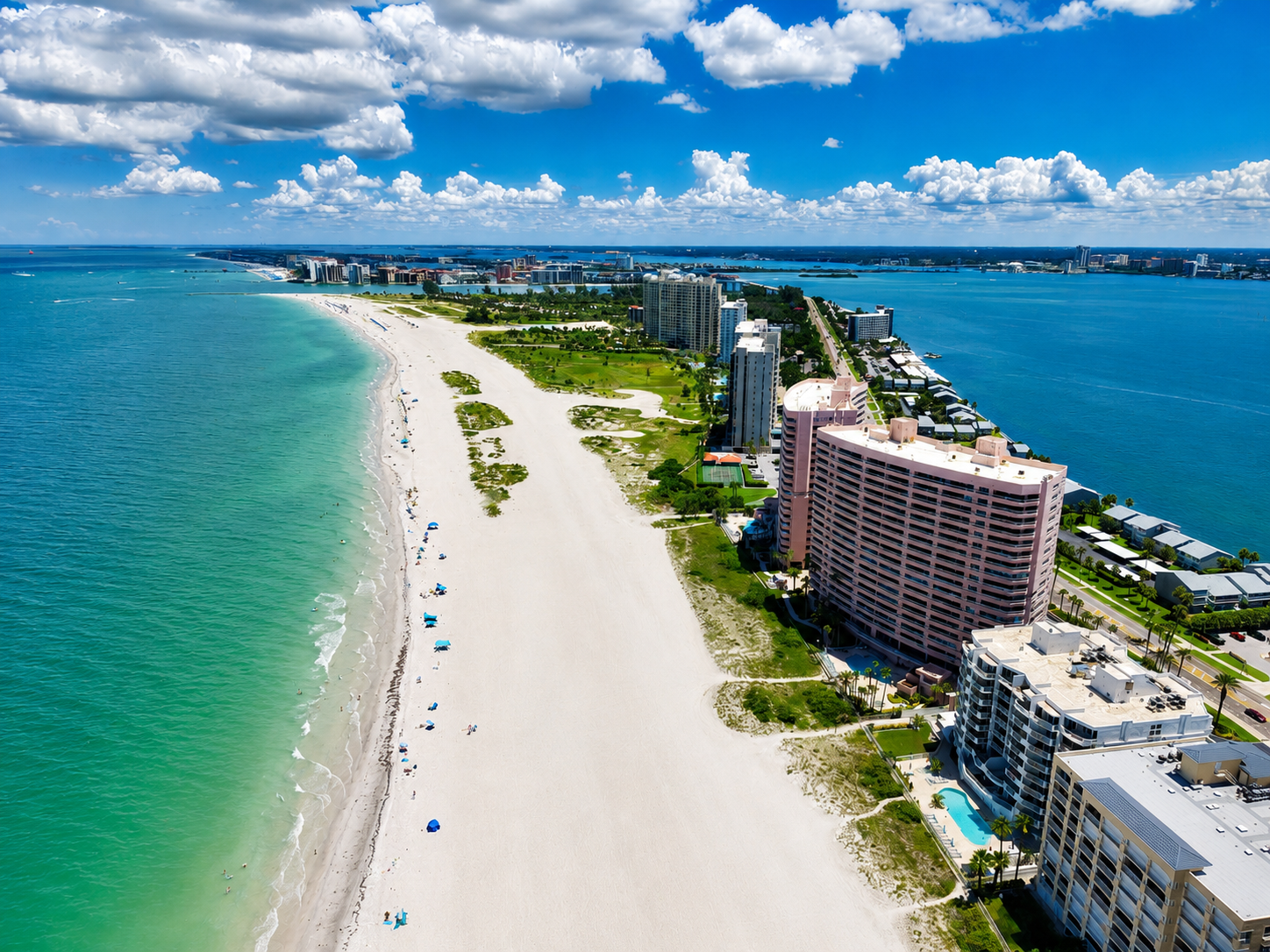 Coastal beachfront condos and turquoise water