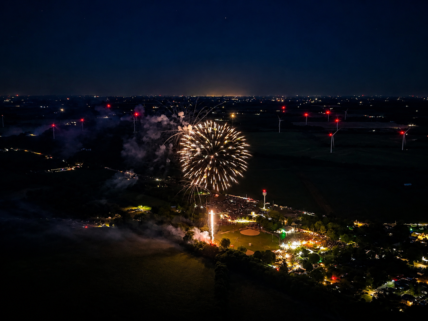 Aerial fireworks display over town